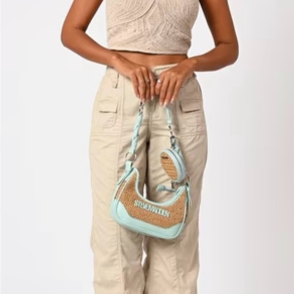 STEVE MADDEN
Bdaryll Shoulder Bag with Adjustable Strap - Picture 9 of 11